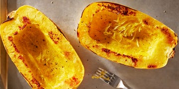 spaghetti squash roasted on a pan