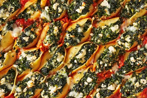 spanakopita stuffed shells filled with spinach, scallions, dill and feta
