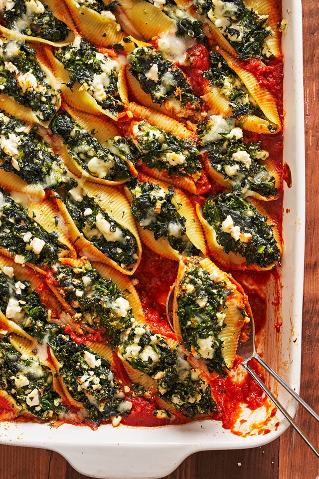 spanakopita stuffed shells filled with spinach, scallions, dill and feta