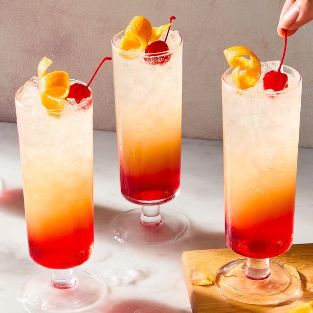 Sparkling Tequila Sunrise sparkling tequila sunrise with a cherry and orange peel