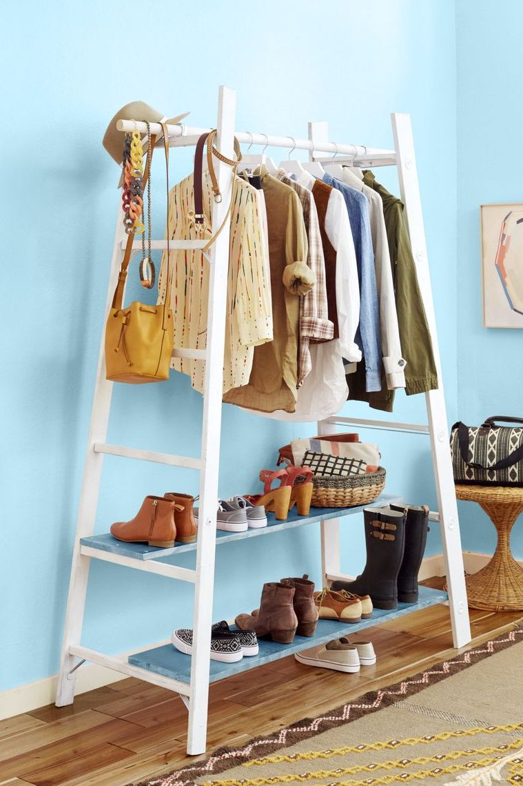 a rack with clothes and shoes