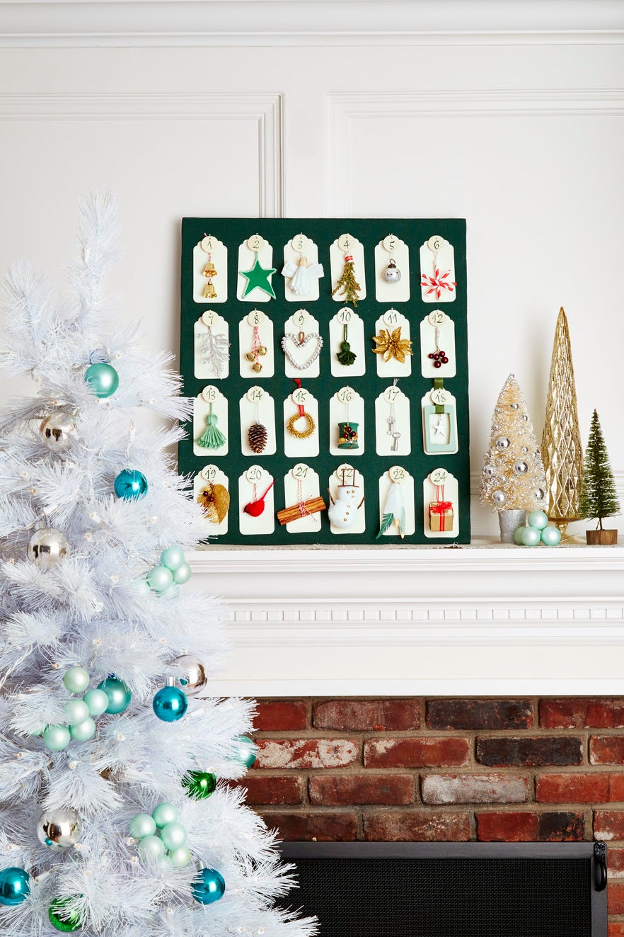 advent calendar on fireplace mantel next to christmas tree holiday decor interior design, fireplace mantel