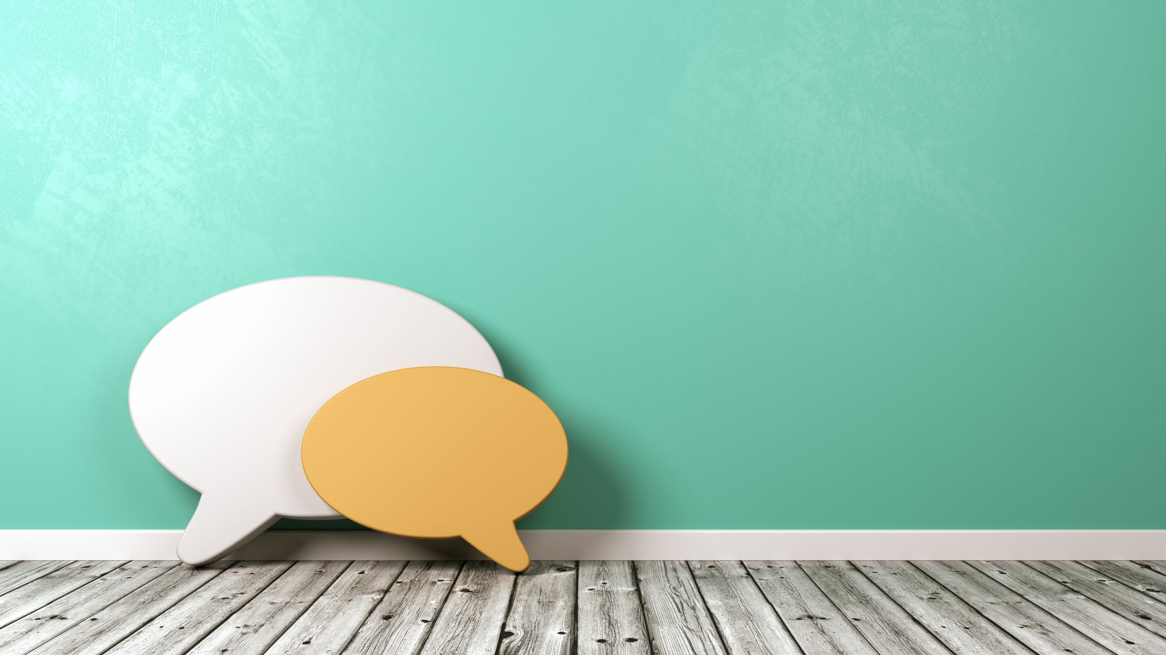 Speech Bubble Shapes Against Wall with Copyspace