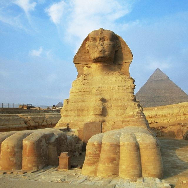 sphinx in front of pyramids, giza, cairo, egypt