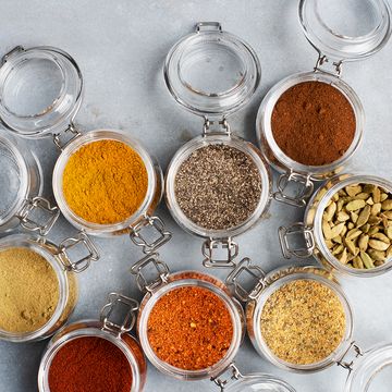 open glass jars with spices