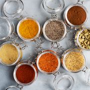 open glass jars with spices