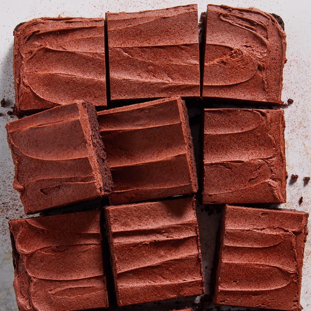 frosted hot chocolate brownies with a spice mix dusting on top