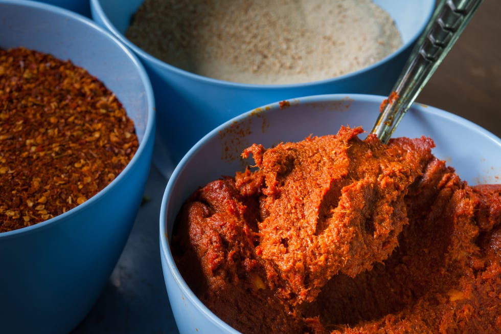 spices of thailand in blue cup on the kitchen