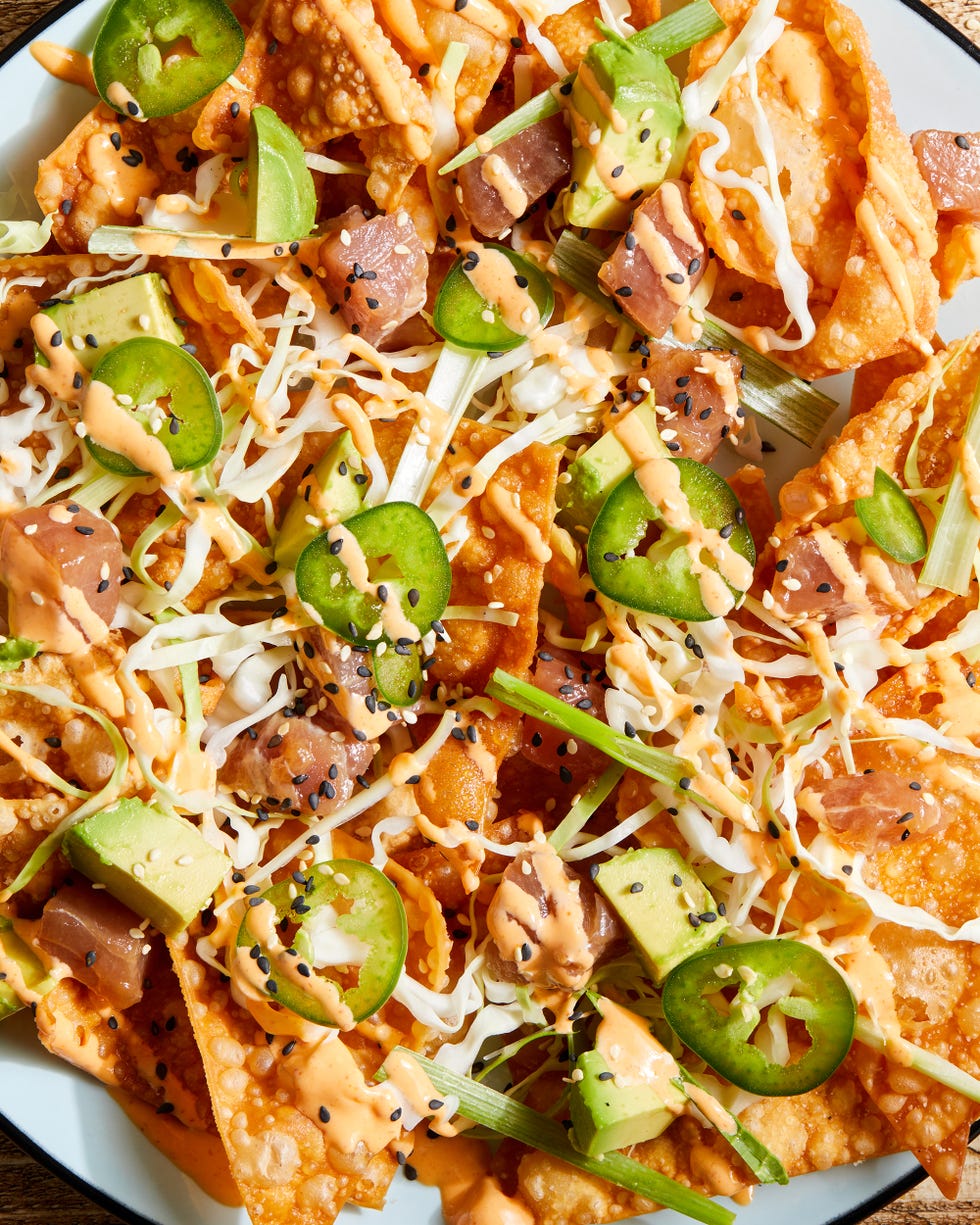 spicy ahi tuna nachos with cabbage, scallions and sesame seeds