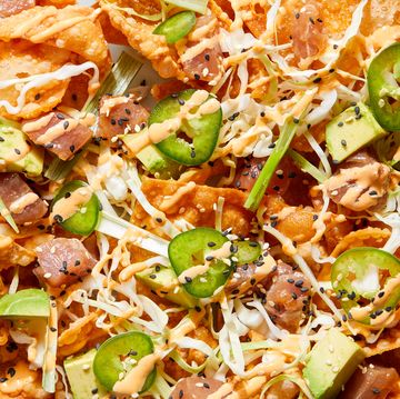 spicy ahi tuna nachos with cabbage, scallions and sesame seeds