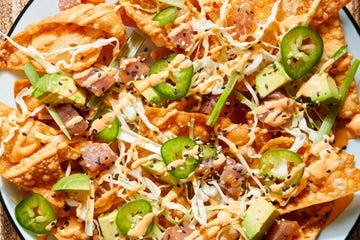 spicy ahi tuna nachos with cabbage, scallions and sesame seeds