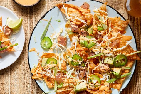 spicy ahi tuna nachos with cabbage, scallions and sesame seeds