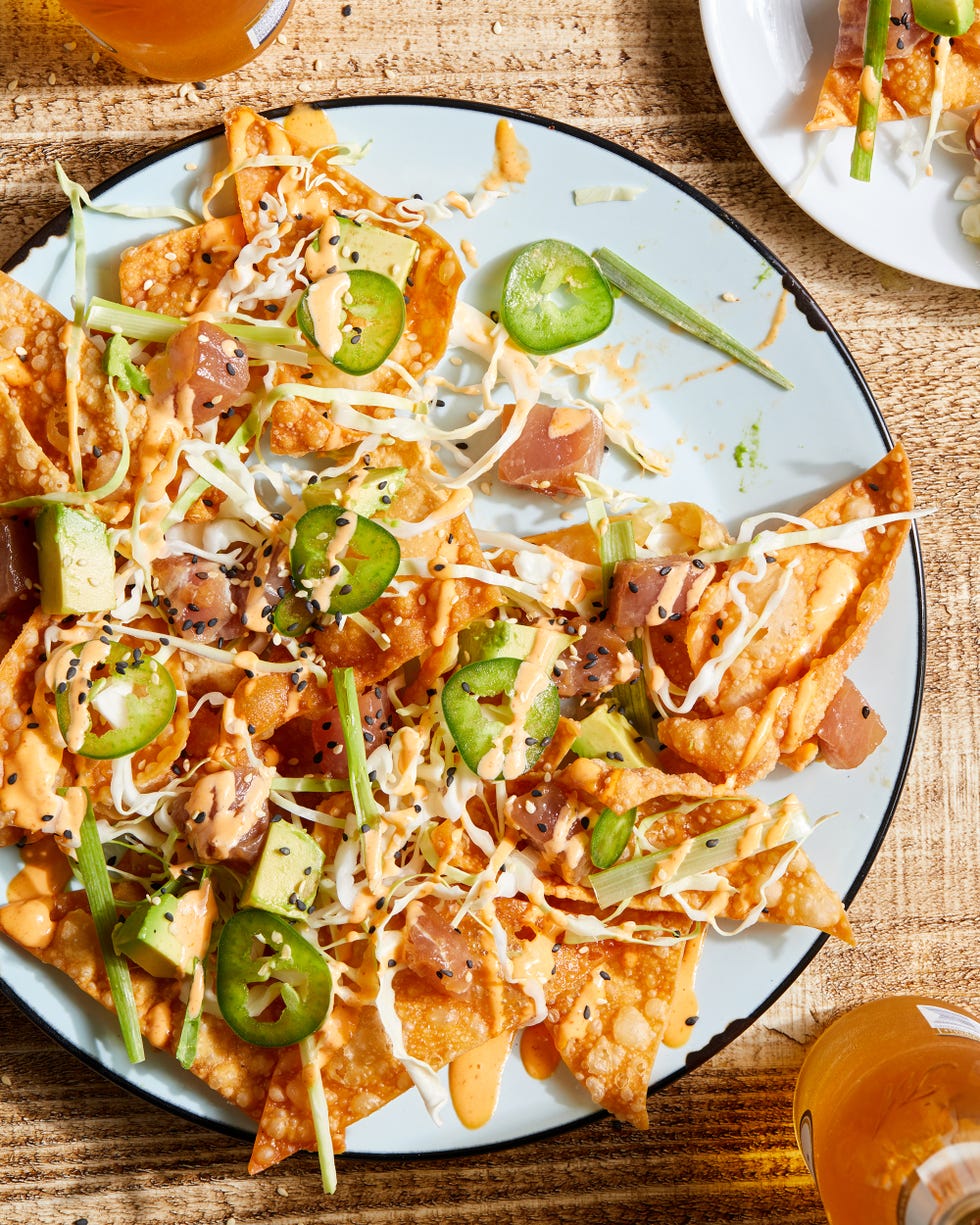 spicy ahi tuna nachos with cabbage, scallions and sesame seeds