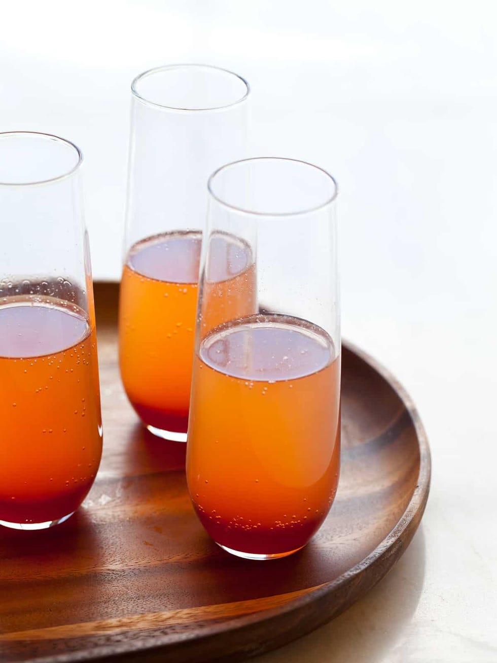 https://hips.hearstapps.com/hmg-prod/images/spicy-blood-orange-champagne-cocktail-1627570278.jpg?crop=0.891xw:1.00xh;0,0&resize=980:*