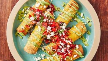 spicy chicken taquitos drizzled with an avocado cream sauce, pico de gallo, and queso fresco