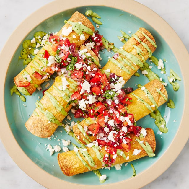 spicy chicken taquitos drizzled with an avocado cream sauce, pico de gallo, and queso fresco