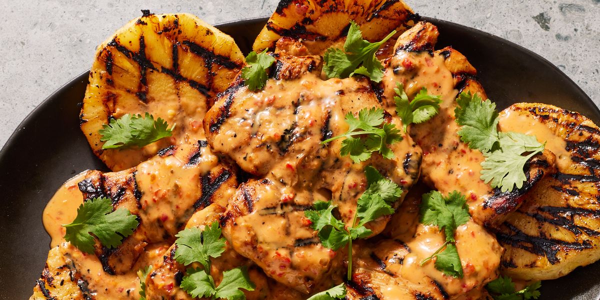 https://hips.hearstapps.com/hmg-prod/images/spicy-coconut-grilled-chicken-1672870819.jpg?crop=0.946xw:0.696xh;0.0304xw,0.149xh&resize=1200:*