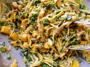 spicy mango slaw with cabbage, mint, cilantro, shallots