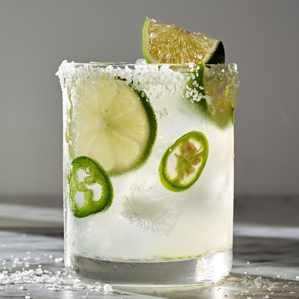 spicy margarita with jalapeno slices and lime