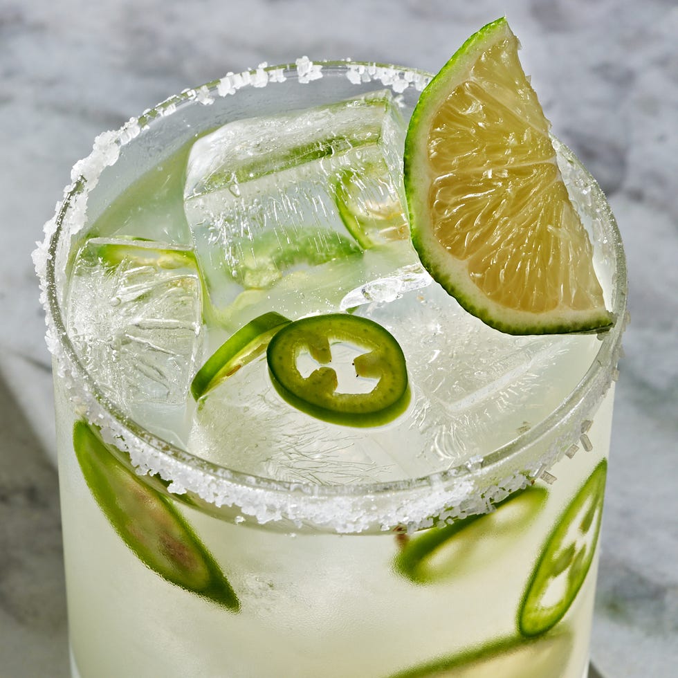 spicy margarita with jalapeno slices and lime