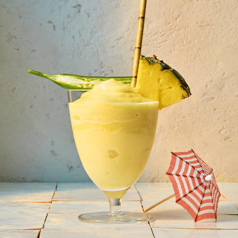 frozen spicy pina colada with a slice of pineapple