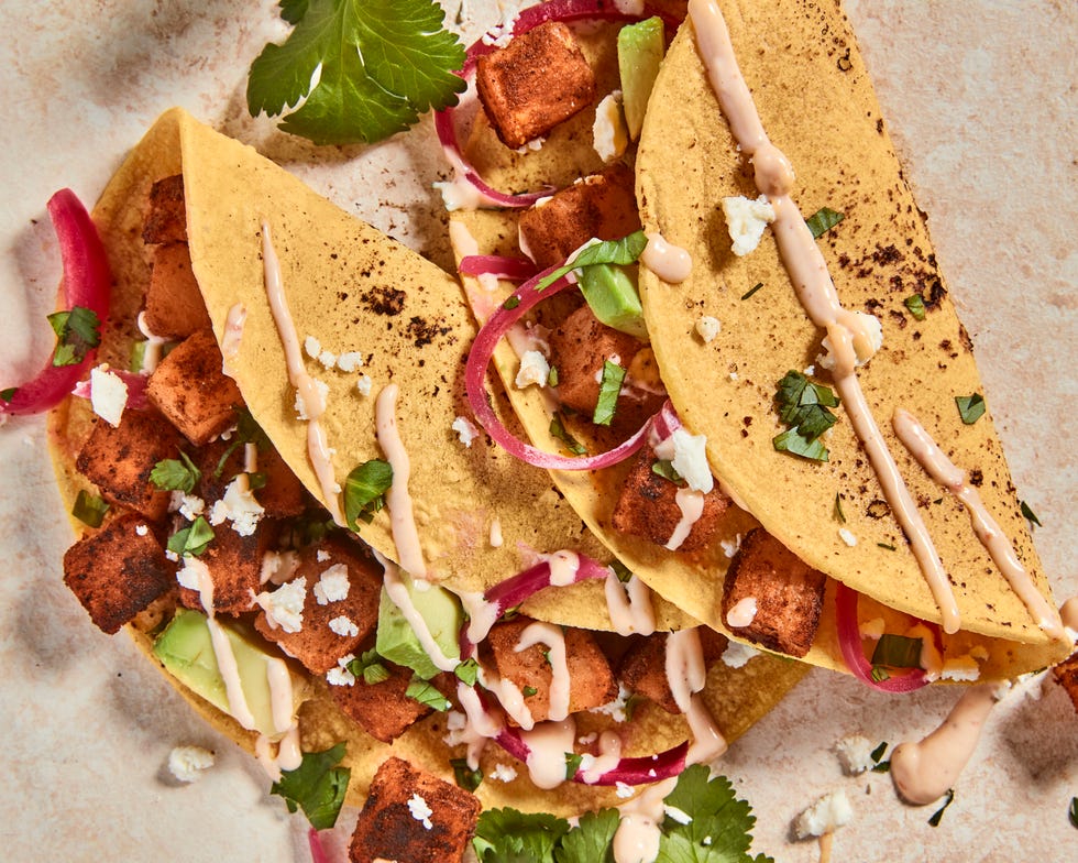 spicy potato tacos with cilantro and onions