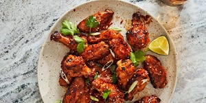 spicy apricot glazed wings served with cilantro and lime wedges