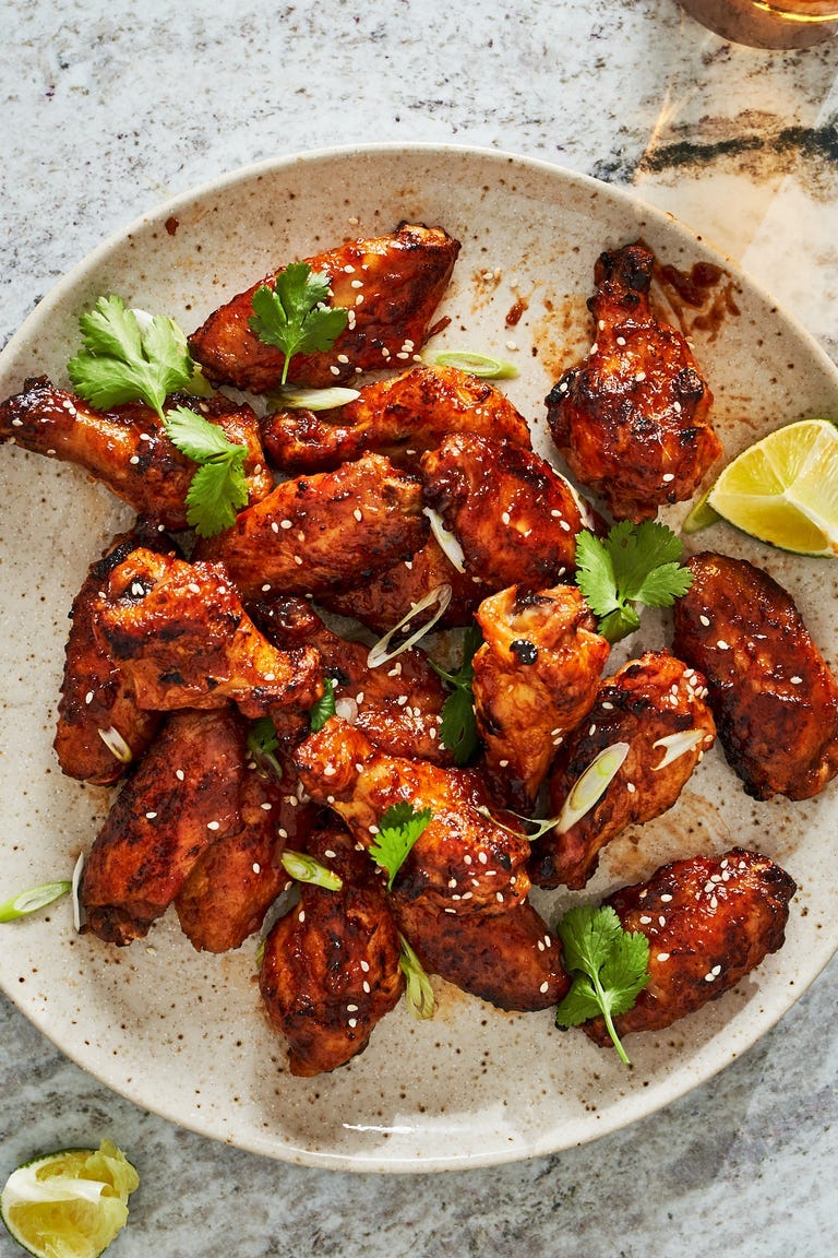 spicy apricot glazed wings served with cilantro and lime wedges