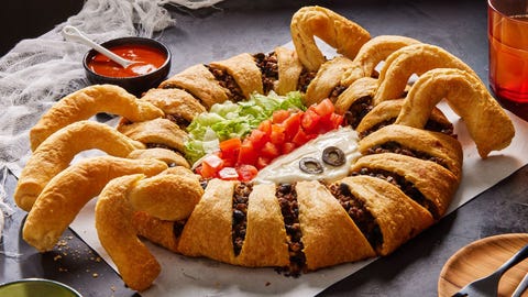crescent taco ring shaped like a spider