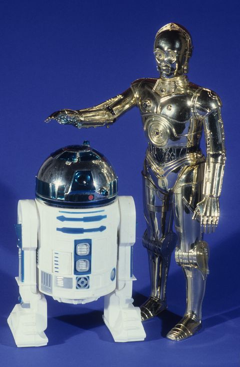 Spielzeugroboter - Roboter R2 D2 (l) und C3 PO