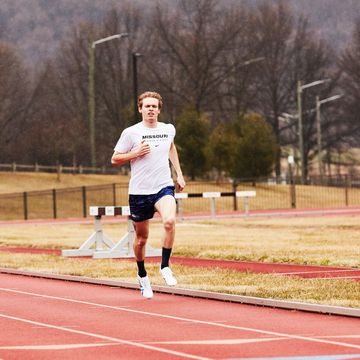 a runner shirt Running fast on a track