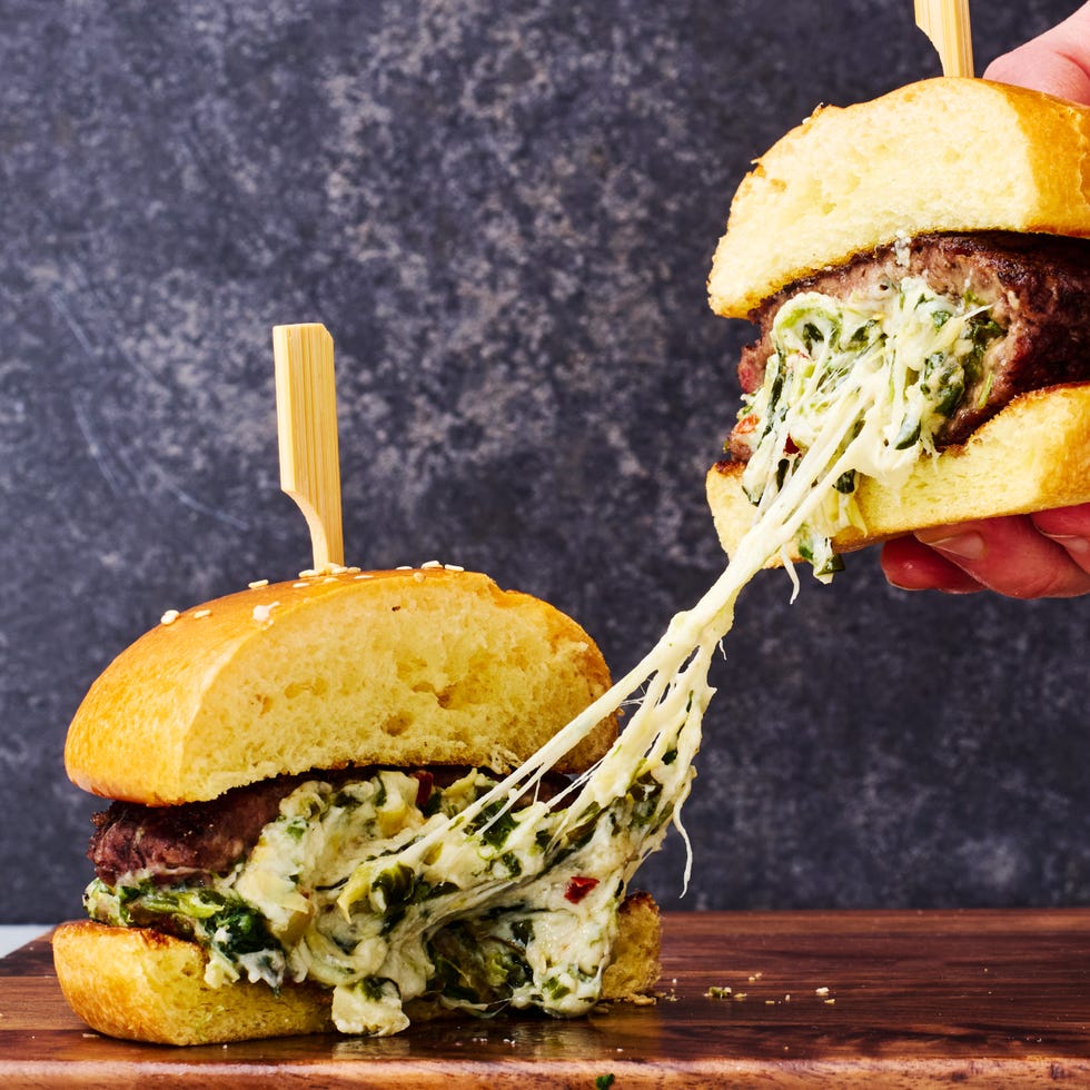 burgers filled with spinach artichoke dip
