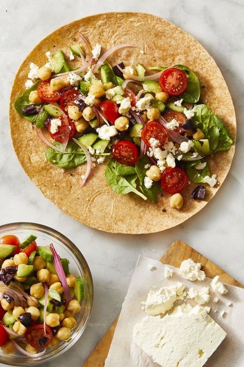 greek salad wrap on a marble surface
