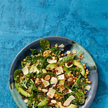 spinach salad with crispy lentils and aged gouda