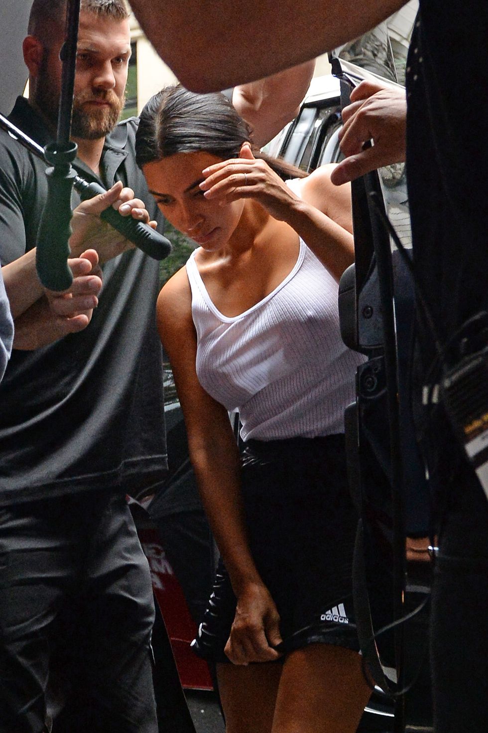 Kim Kardashian Goes Bra-Free in Sheer White Tank Top