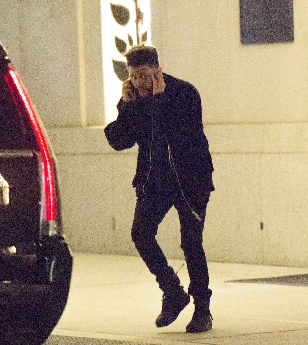 The Weeknd leaving Bella Hadid's apartment