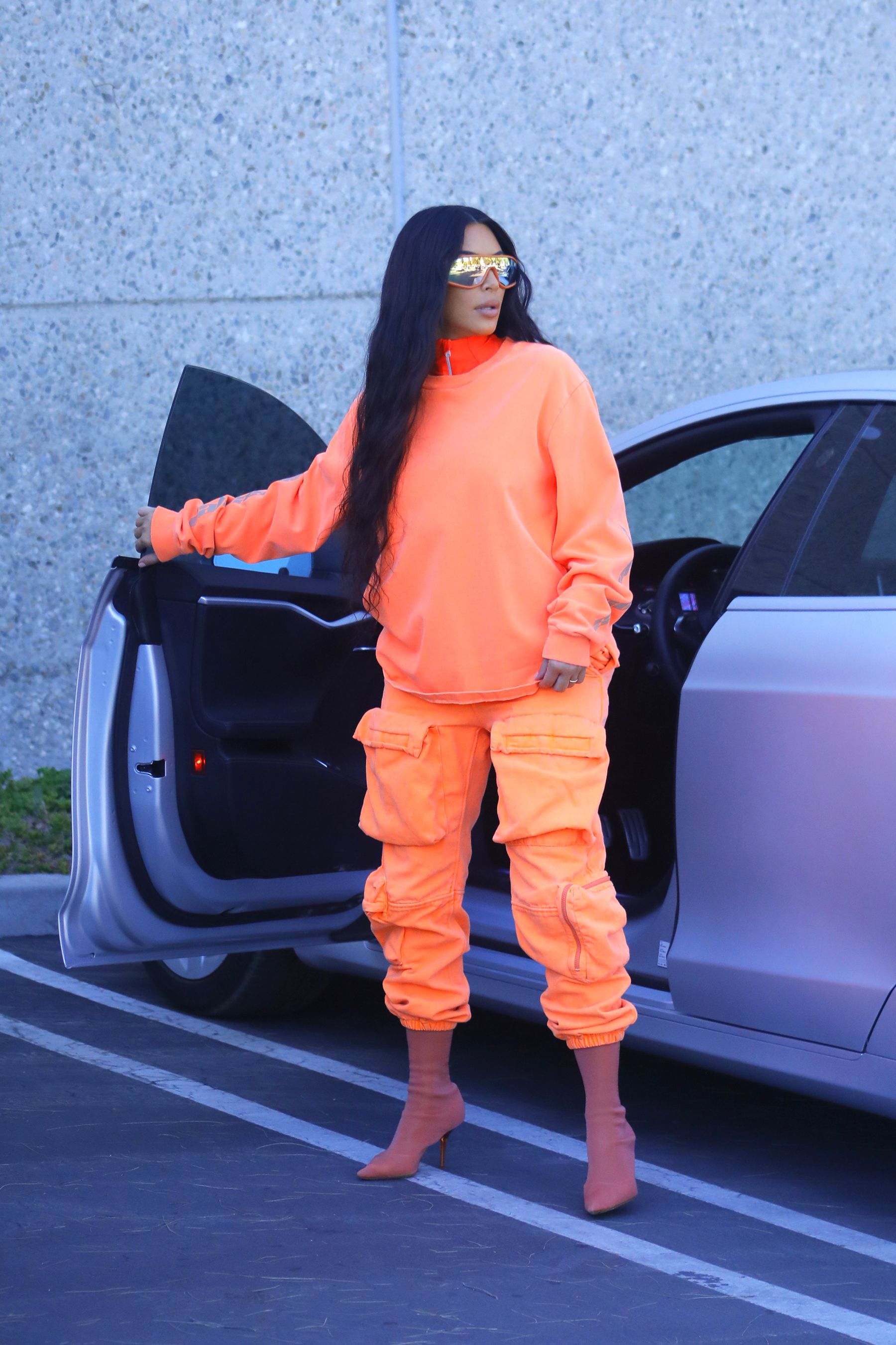 Kim Kardashian's Latest Yeezy Photo Shoot - Kim Kardashian Wears Bright Cargo Pants and Athleisure Looks