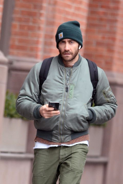 Jake Gyllenhaal takes a morning walk while chatting on his cellphone