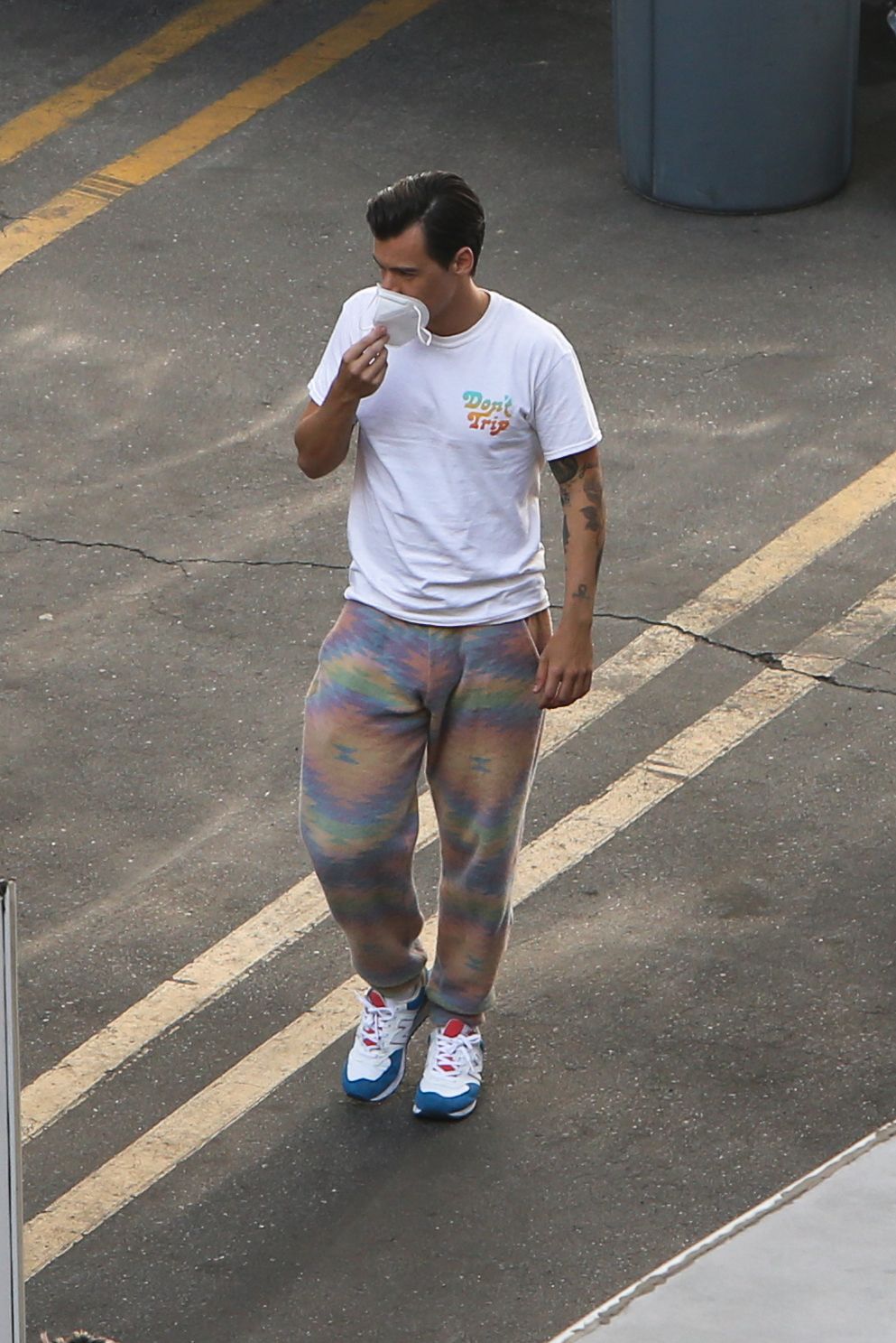 Harry Styles Debuts a New Retro Haircut and Tie-Dyed Sweats