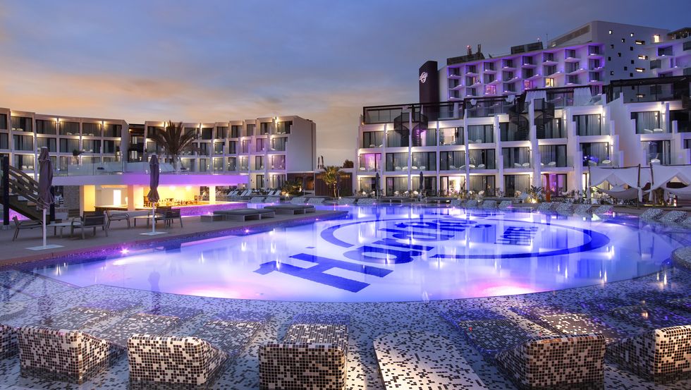Swimming pool, Building, Resort town, Town, Lighting, Purple, Sky, Resort, Architecture, Hotel, 