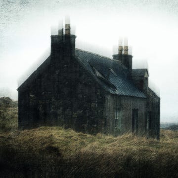 a spooky abandoned ruined cottage on a bleak empty moorland mountain in scotland on a winters day with a grunge, textured edit