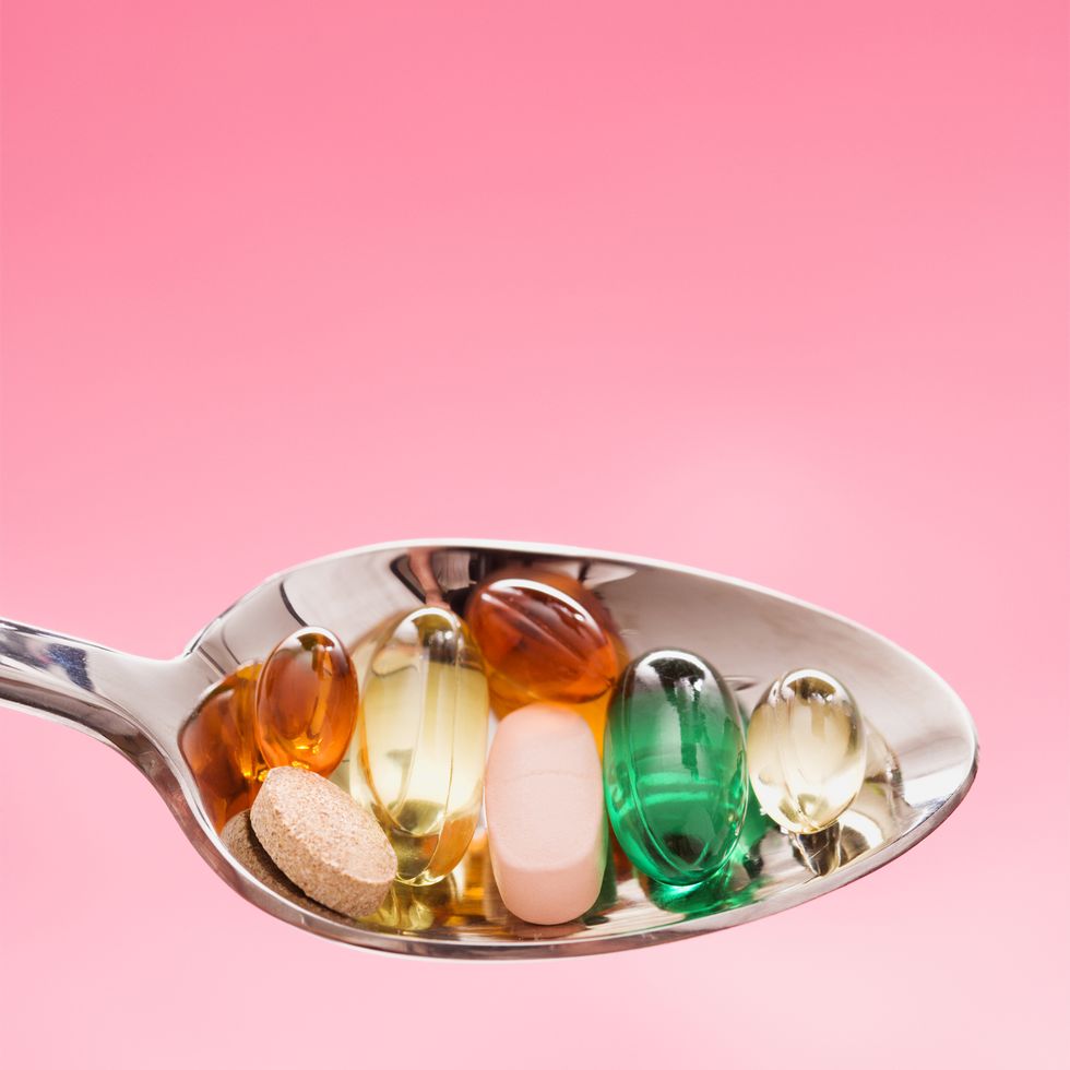 spoonful of pills isolated