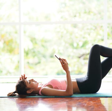 Sport fitness women in relaxing pose after exercise