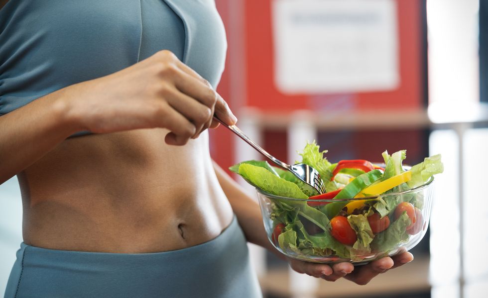 sport woman with healthy food