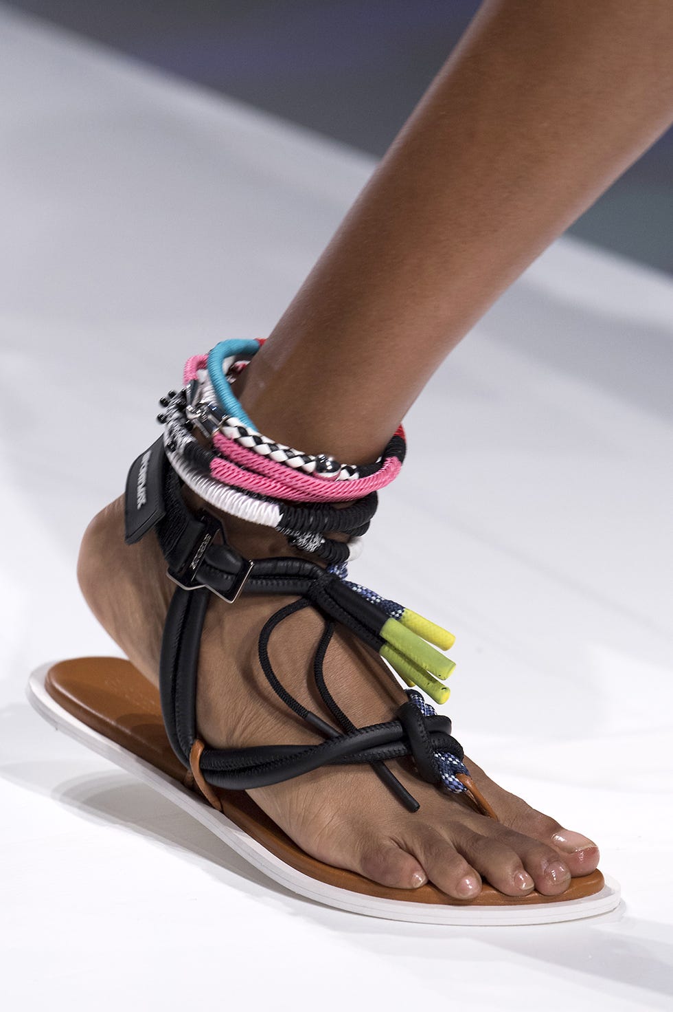 Footwear, Fashion, Shoe, Sandal, Leg, Ankle, Human leg, Brown, Joint, Haute couture, 