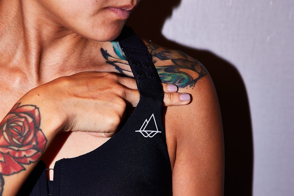 checking the straps on a sports bra