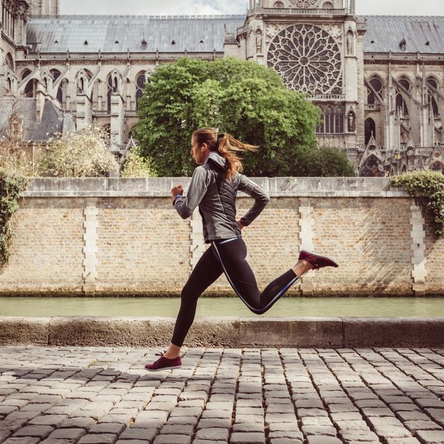 Sports woman jogging in Paris