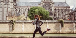 Sports woman jogging in Paris