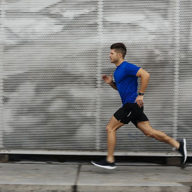https://hips.hearstapps.com/hmg-prod/images/sportsman-running-against-metal-wall-royalty-free-image-1665163997.jpg?crop=0.668xw:1.00xh;0.199xw,0&resize=640:*