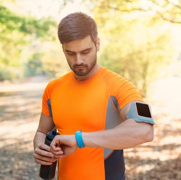 Sportsman using a smart watch sportsman using a smart watch